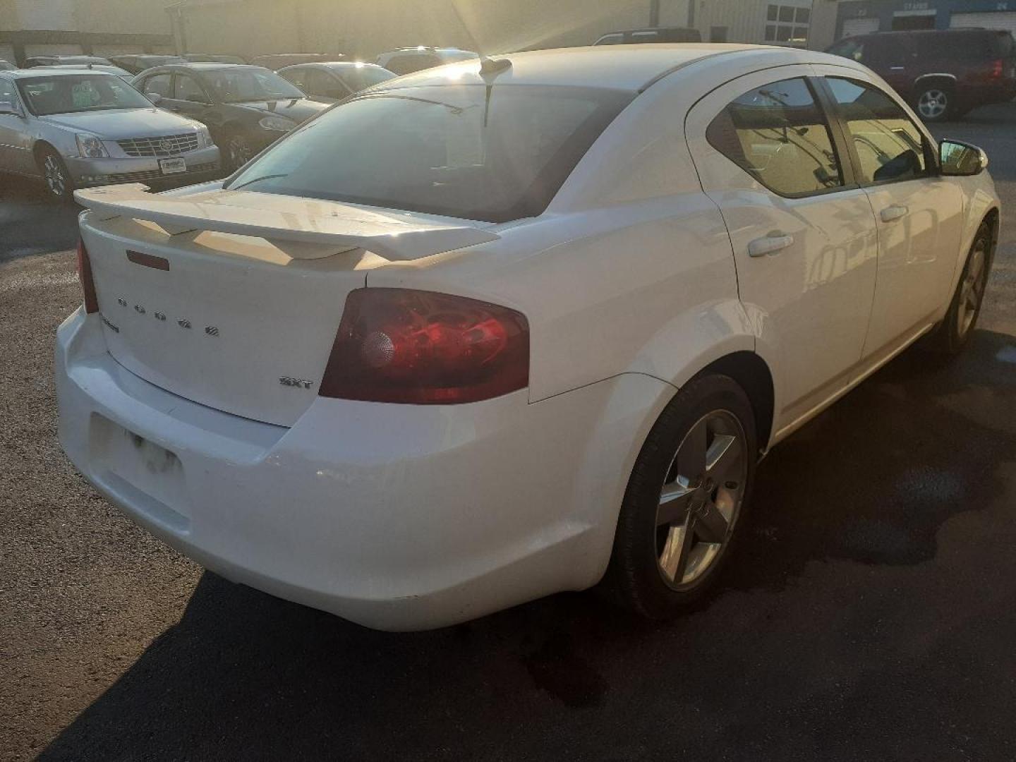 2012 Dodge Avenger SXT (1C3CDZEG0CN) with an 3.6L V6 DOHC 24V engine, 6-Speed Automatic transmission, located at 2015 Cambell Street, Rapid City, SD, 57701, (605) 342-8326, 44.066433, -103.191772 - Photo#4